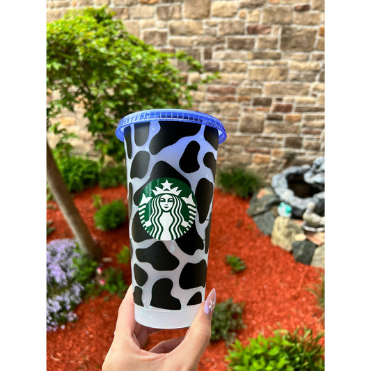 Cow print Starbucks cup with color changing specs